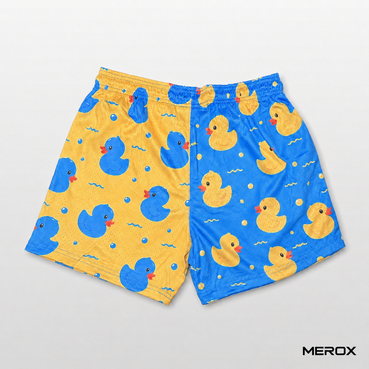 Back view of MEROX blue and yellow rubber duck mesh shorts