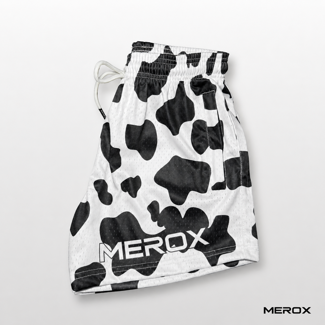 MEROX Black and White Cow Print 5-inch mesh shorts side view
