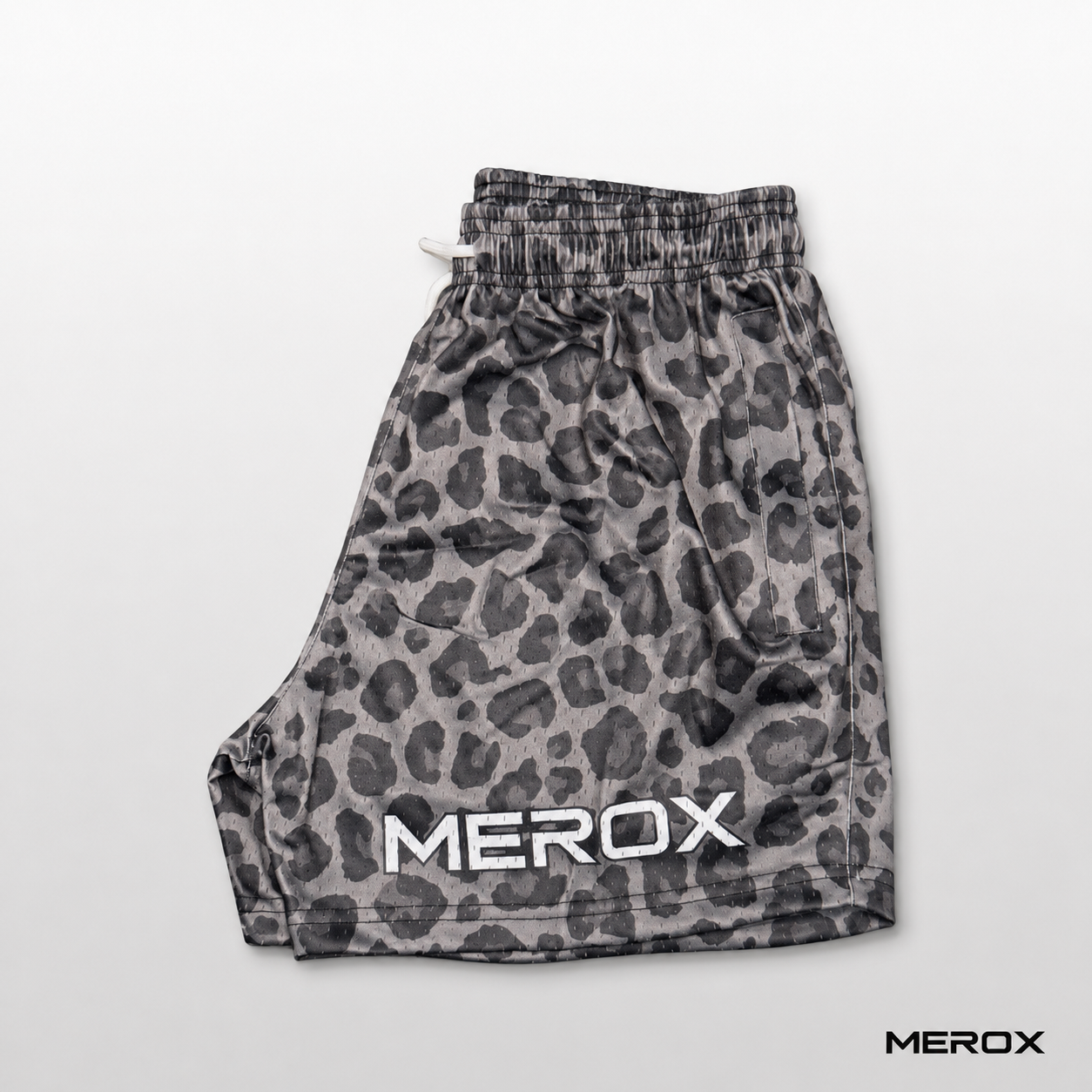 Dark cheetah leopard print mesh shorts side view