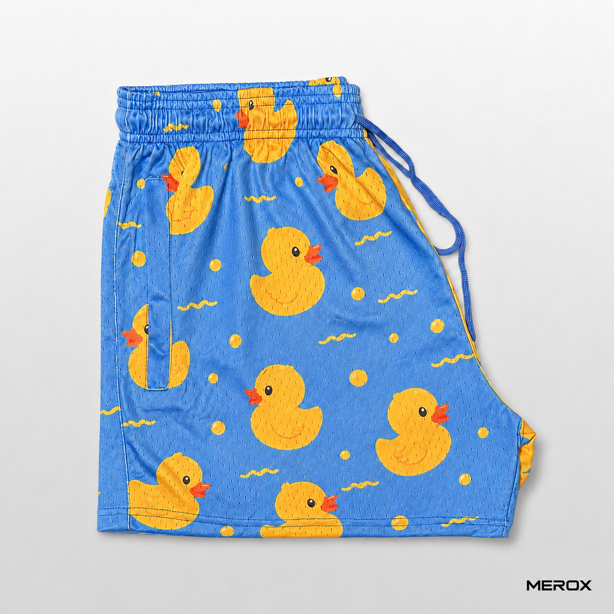 Blue side of MEROX rubber duck print mesh shorts
