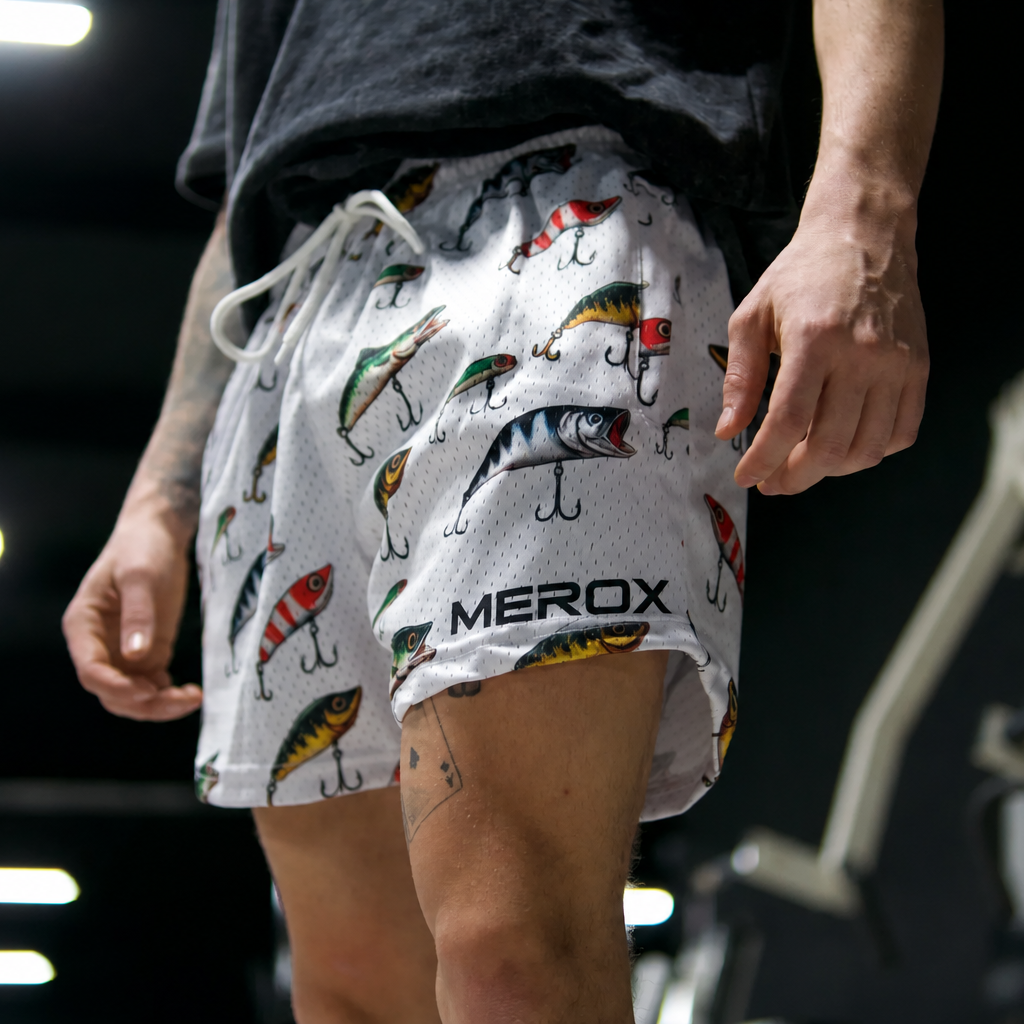 Model wearing MEROX Fishing Lure mesh shorts side view