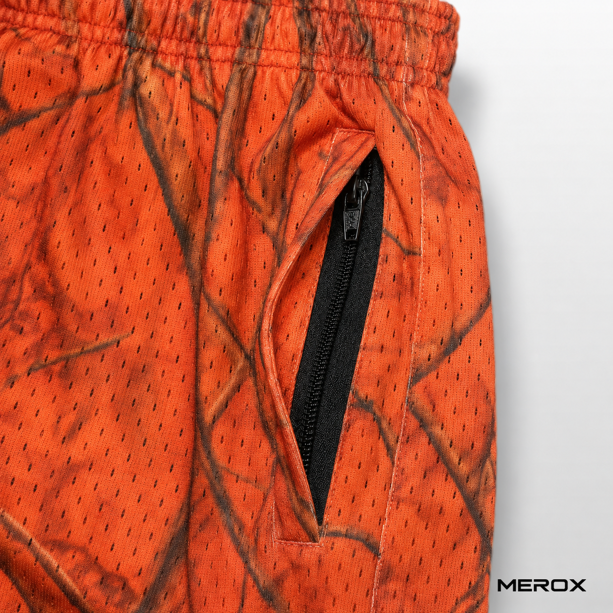 MEROX Orange Camo mesh shorts zipper pocket detail