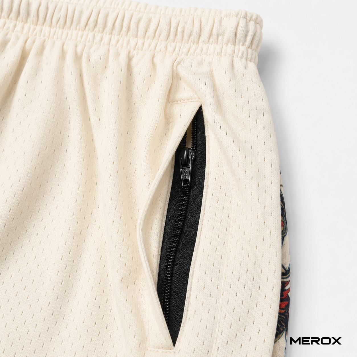 Secure zipper pocket detail on MEROX mesh shorts