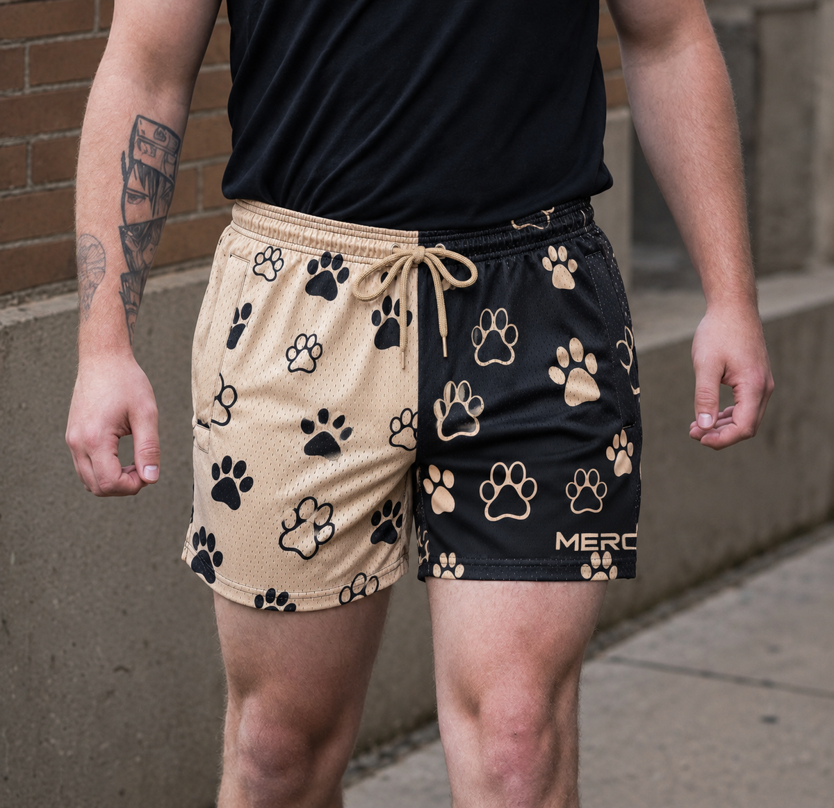 Man wearing MEROX Split Paw Print mesh shorts; approved owned-photo garment adaptation with small tan logo wrapping naturally