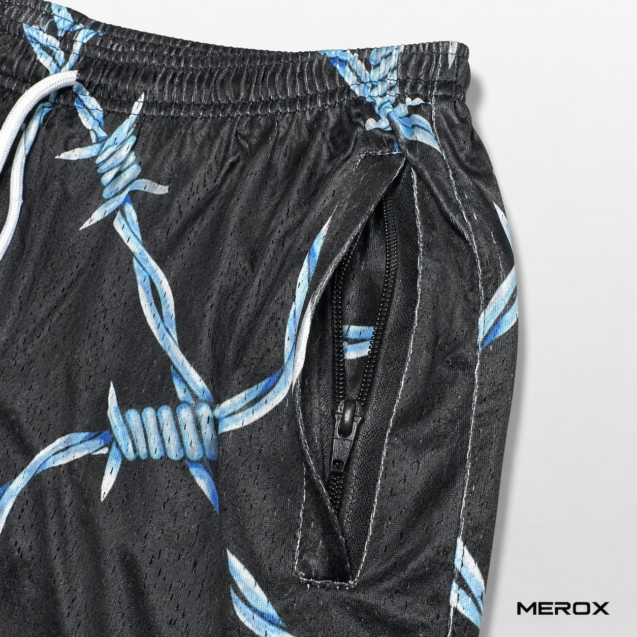 MEROX Barbed Wire mesh shorts zipper pocket detail