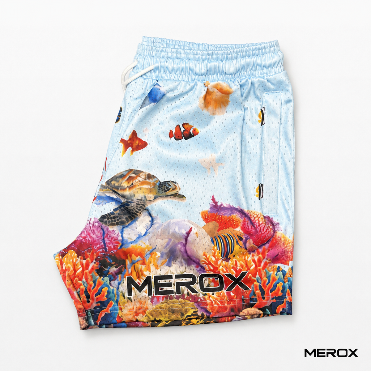 MEROX Blue Ocean mesh shorts branded side view showing coral reef artwork
