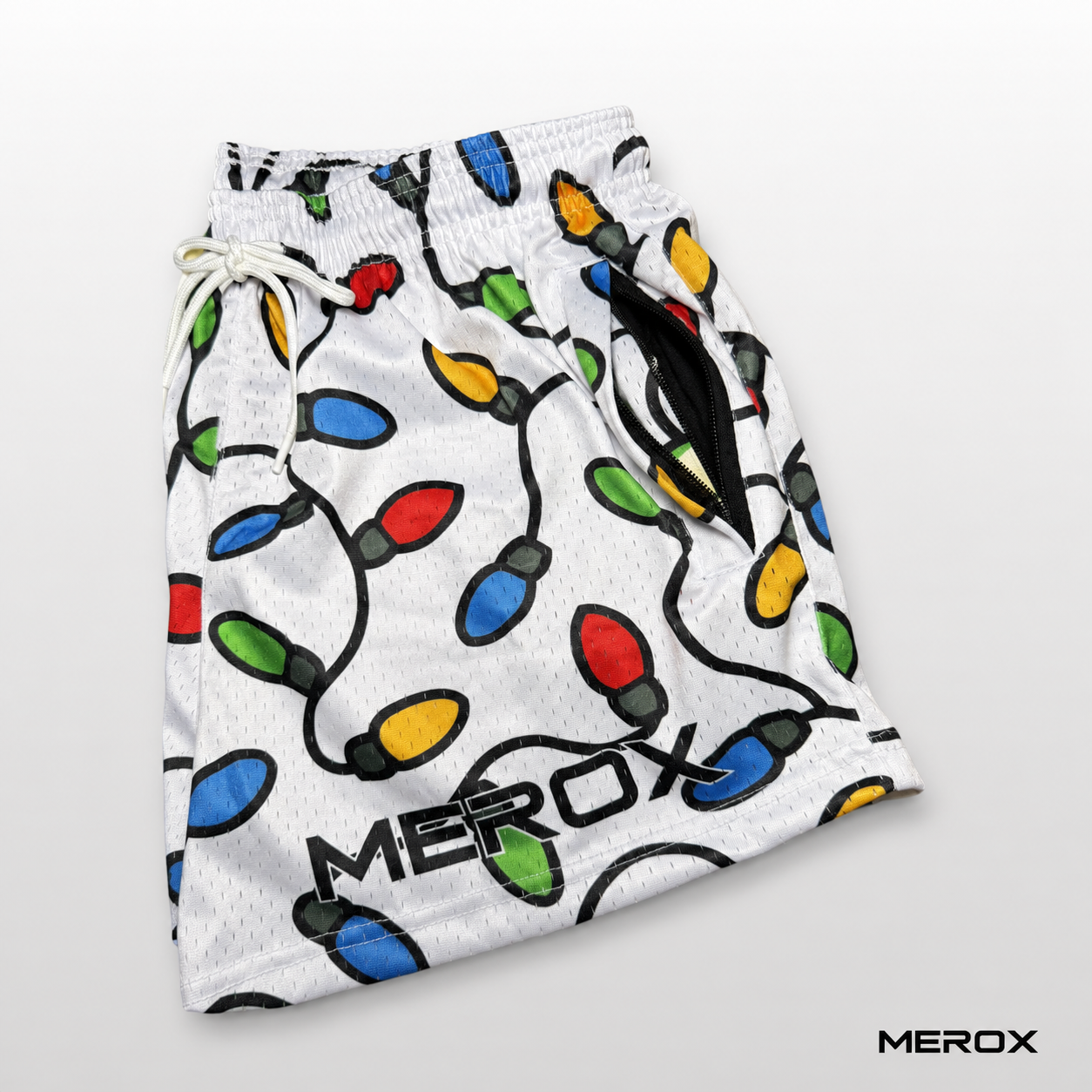 Zipper pocket detail on MEROX Christmas Lights mesh shorts