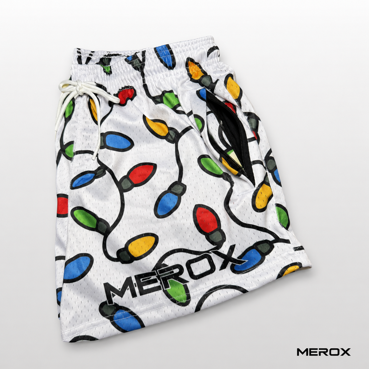 Zipper pocket detail on MEROX Christmas Lights mesh shorts