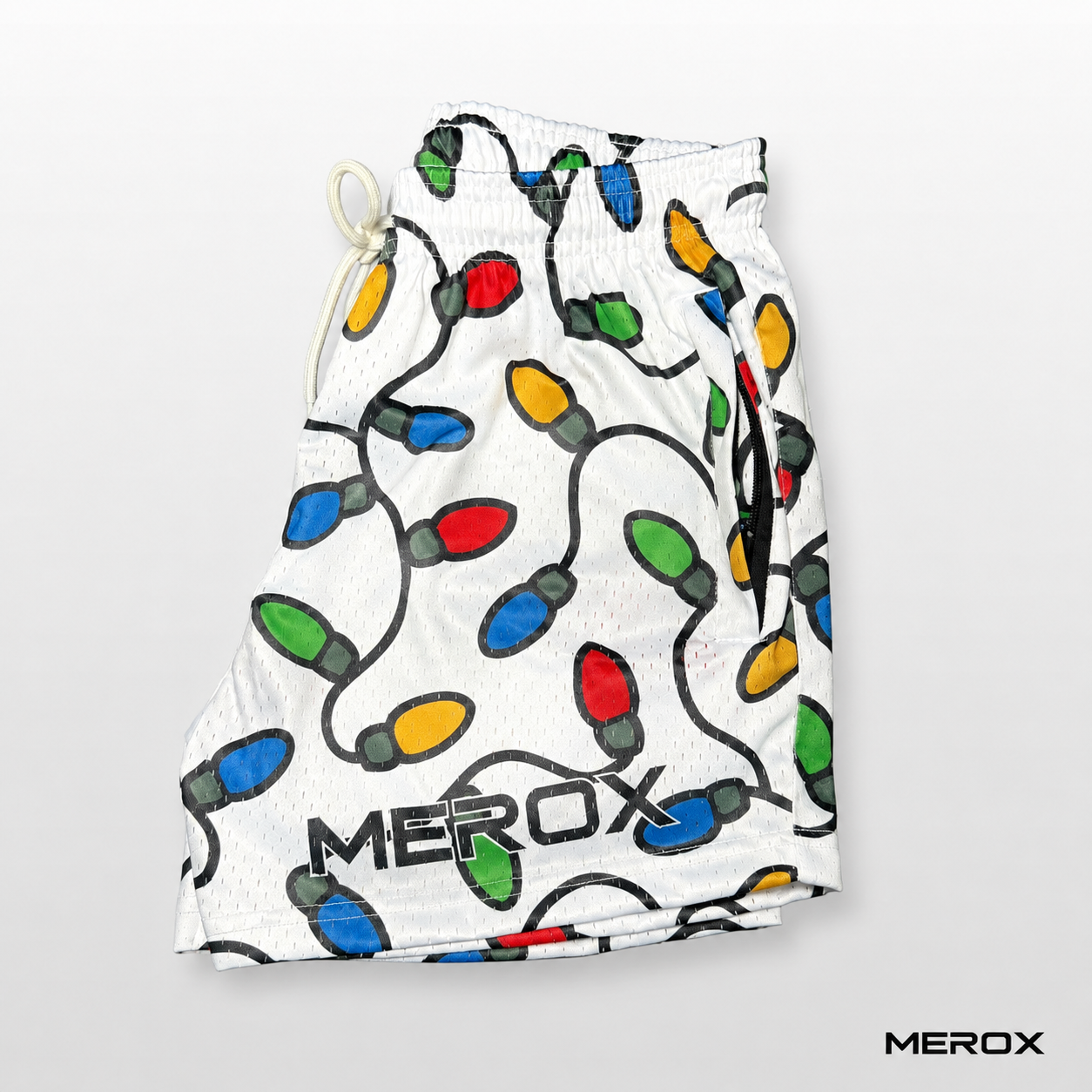 Branded side view of MEROX Christmas Lights 5-inch mesh shorts
