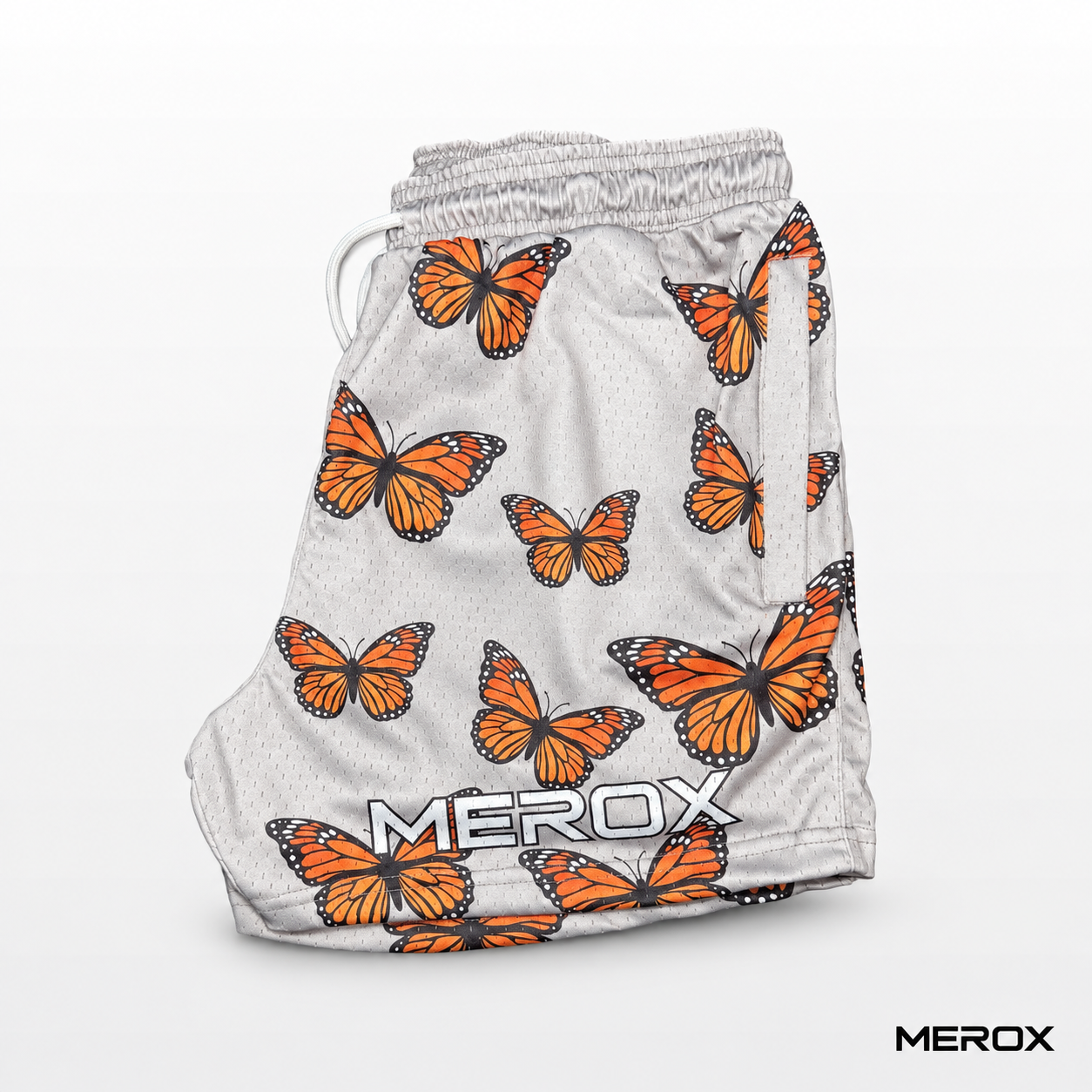 MEROX Monarch Butterfly mesh shorts side view with zipper pocket