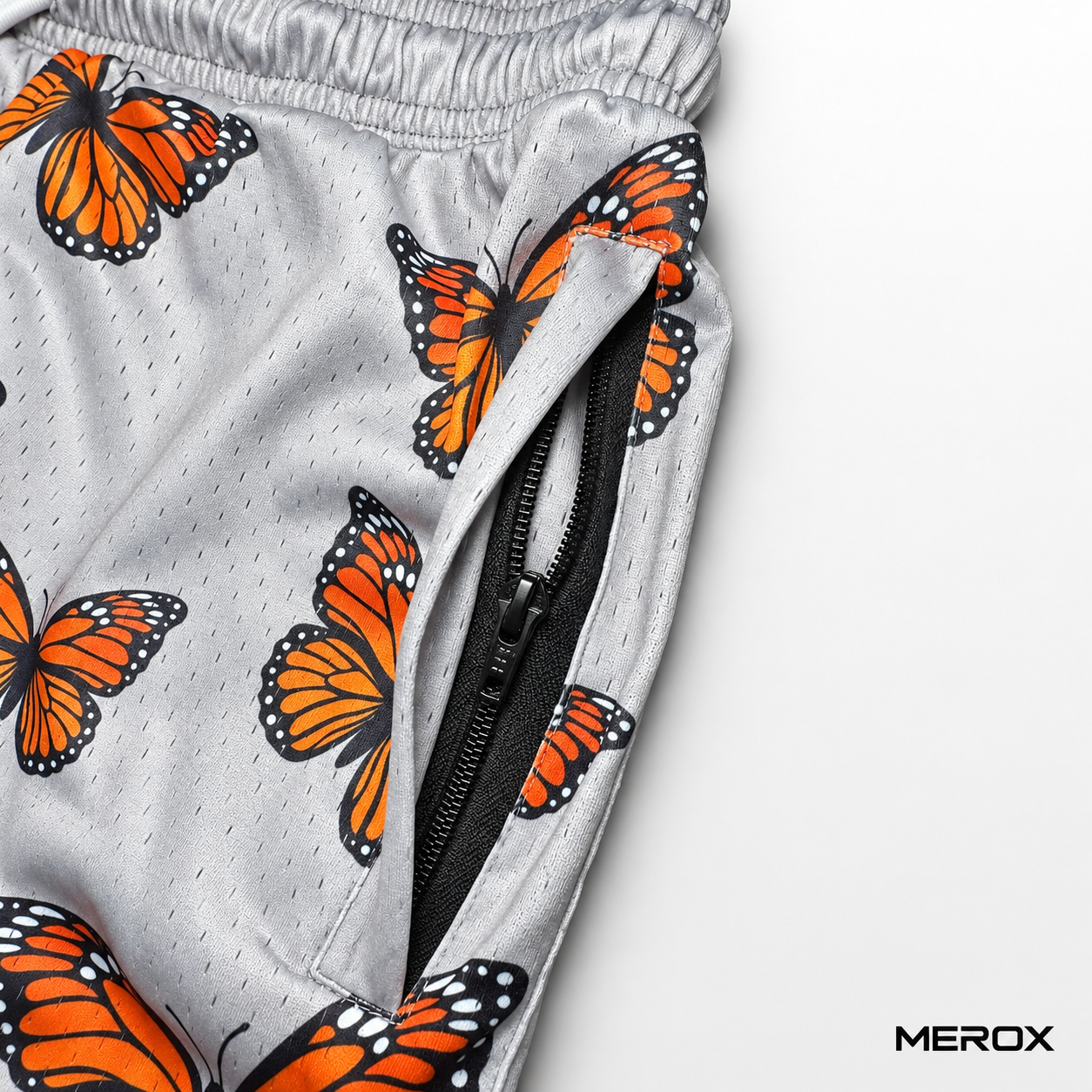 MEROX Monarch Butterfly mesh shorts zipper pocket detail