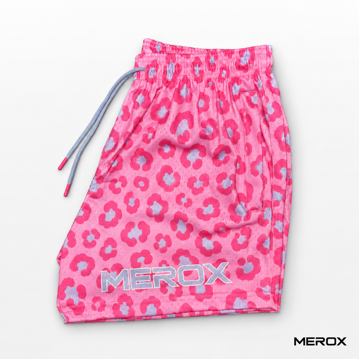 Back view of MEROX pink and blue leopard cheetah mesh shorts