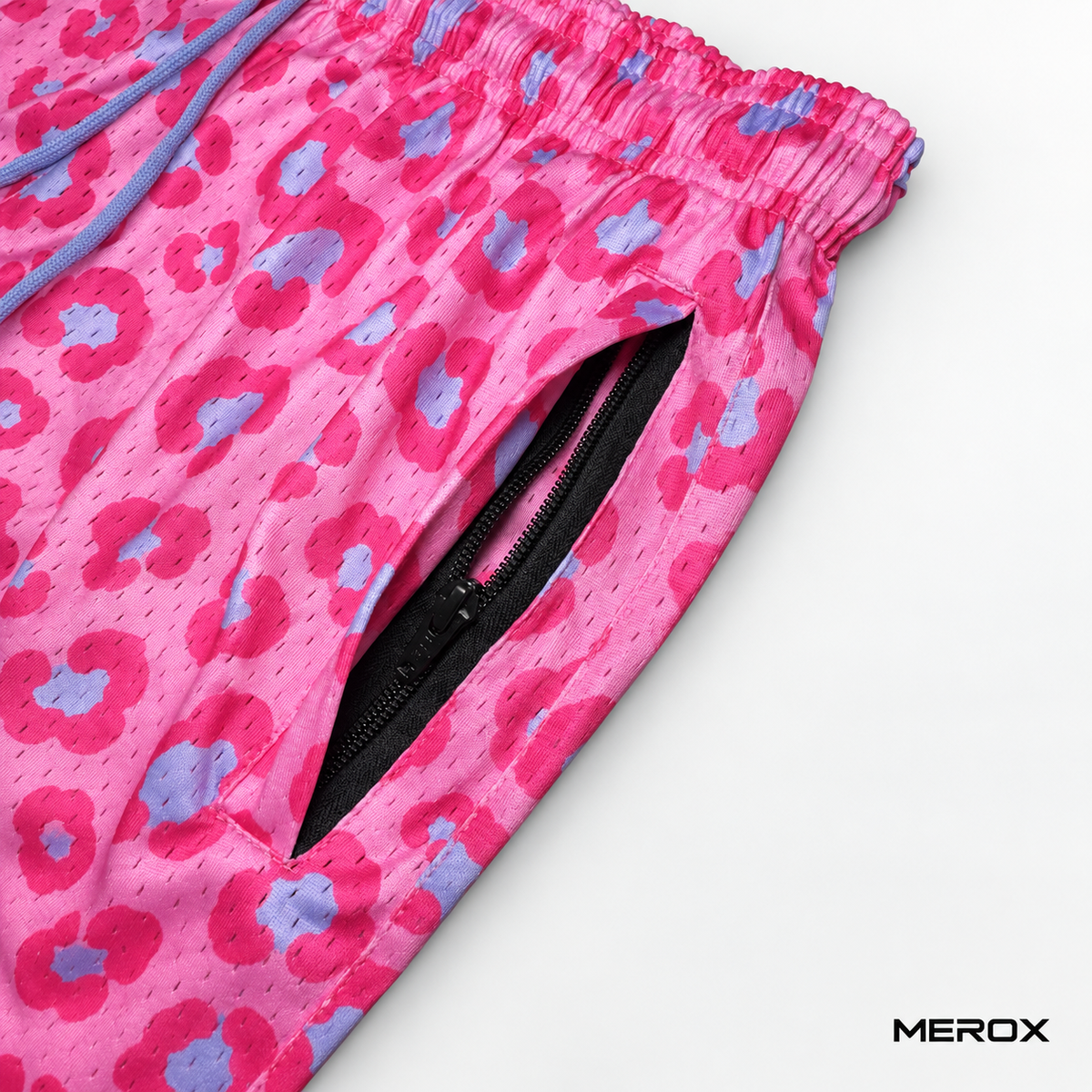 Front view of MEROX pink and blue leopard cheetah mesh shorts