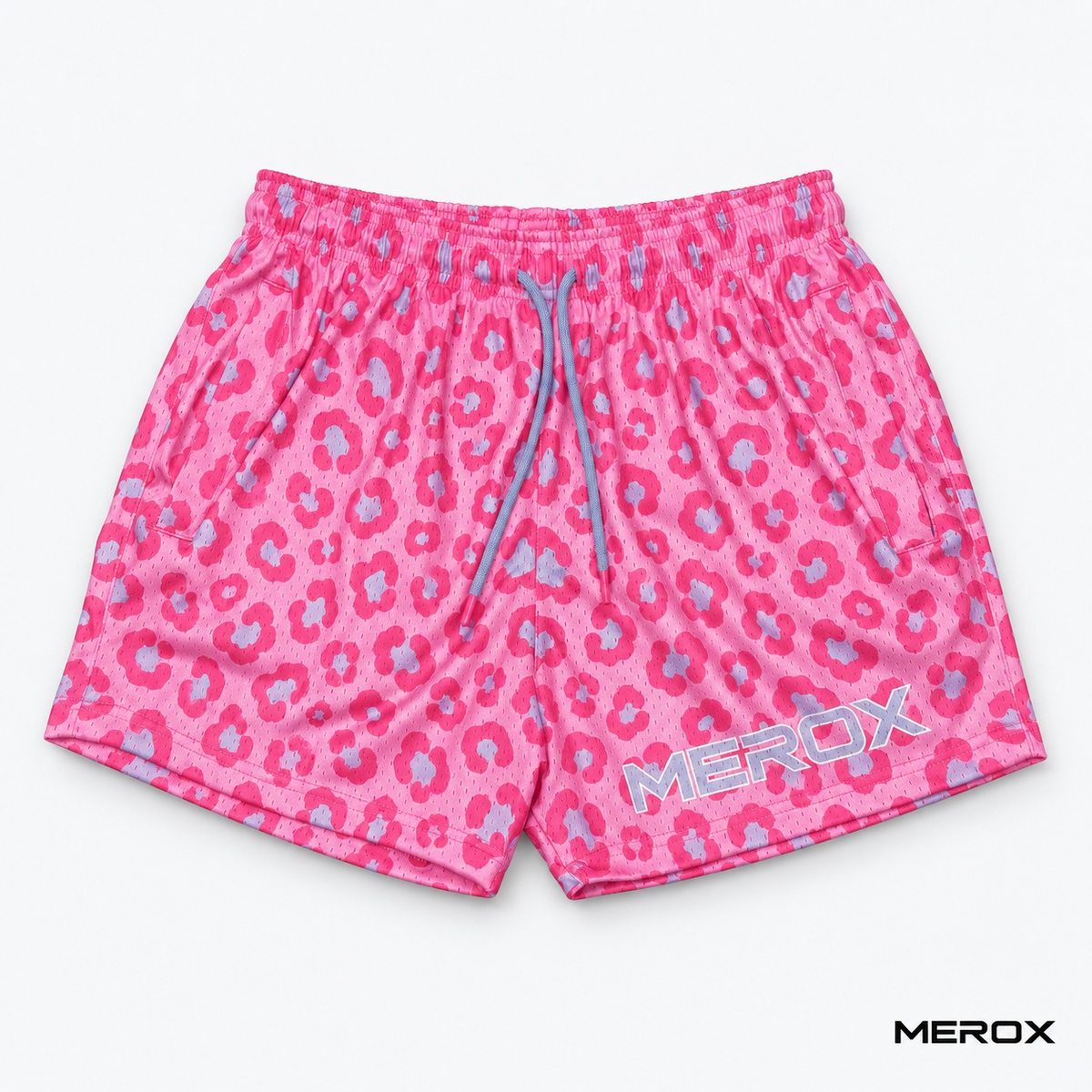 Zipper pocket detail on MEROX pink and blue leopard mesh shorts