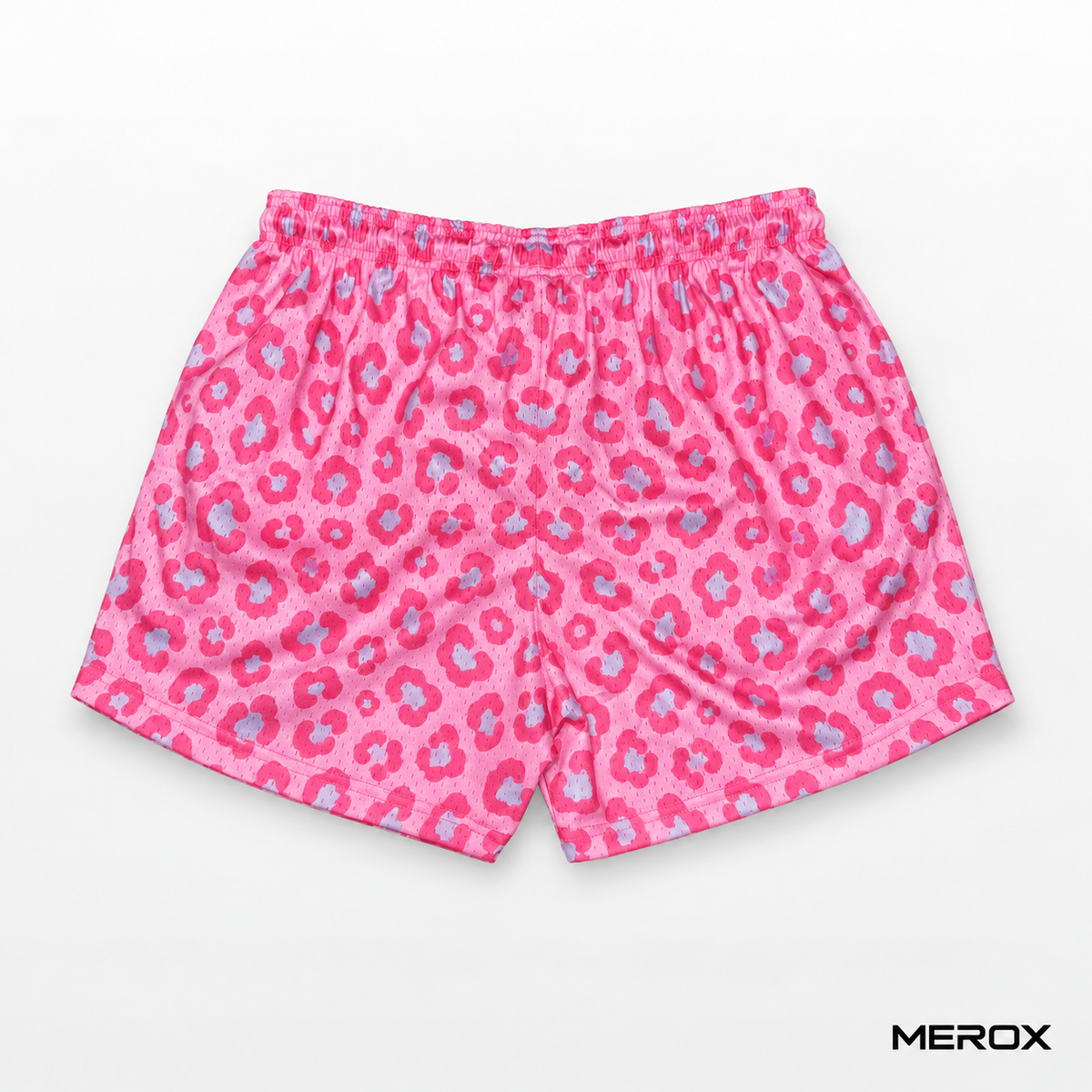 Side view of MEROX pink and blue leopard mesh shorts