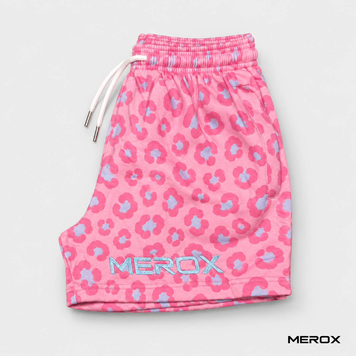 Front view of MEROX pink leopard cotton shorts with zipper pockets