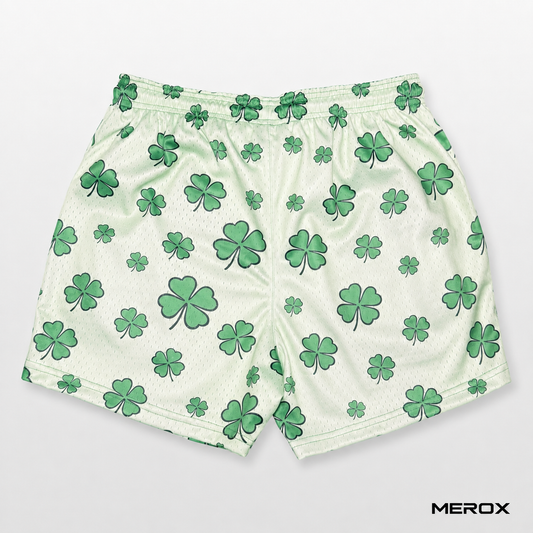 Back view of MEROX green shamrock and four-leaf clover mesh shorts