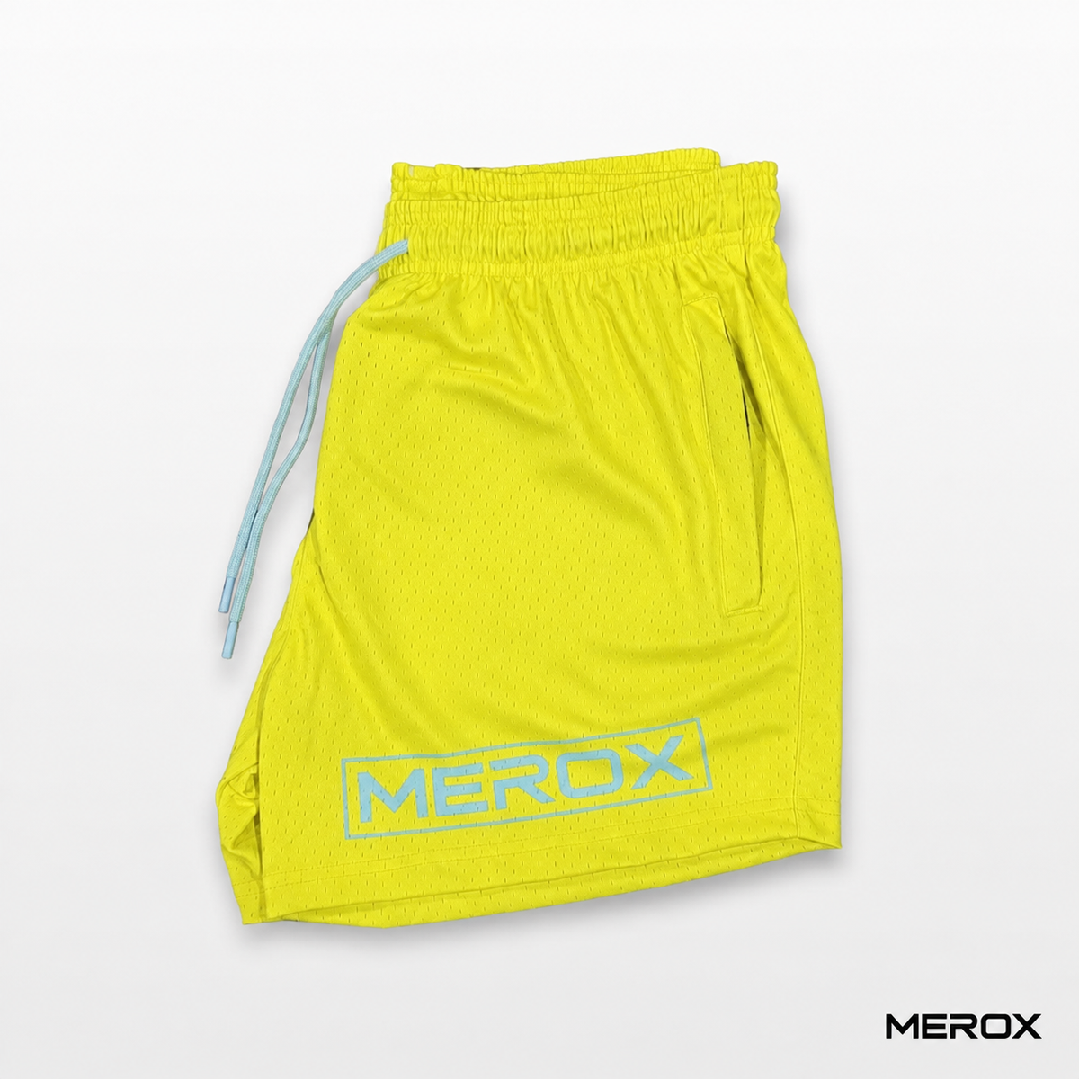 MEROX solid yellow 5-inch mesh shorts side view