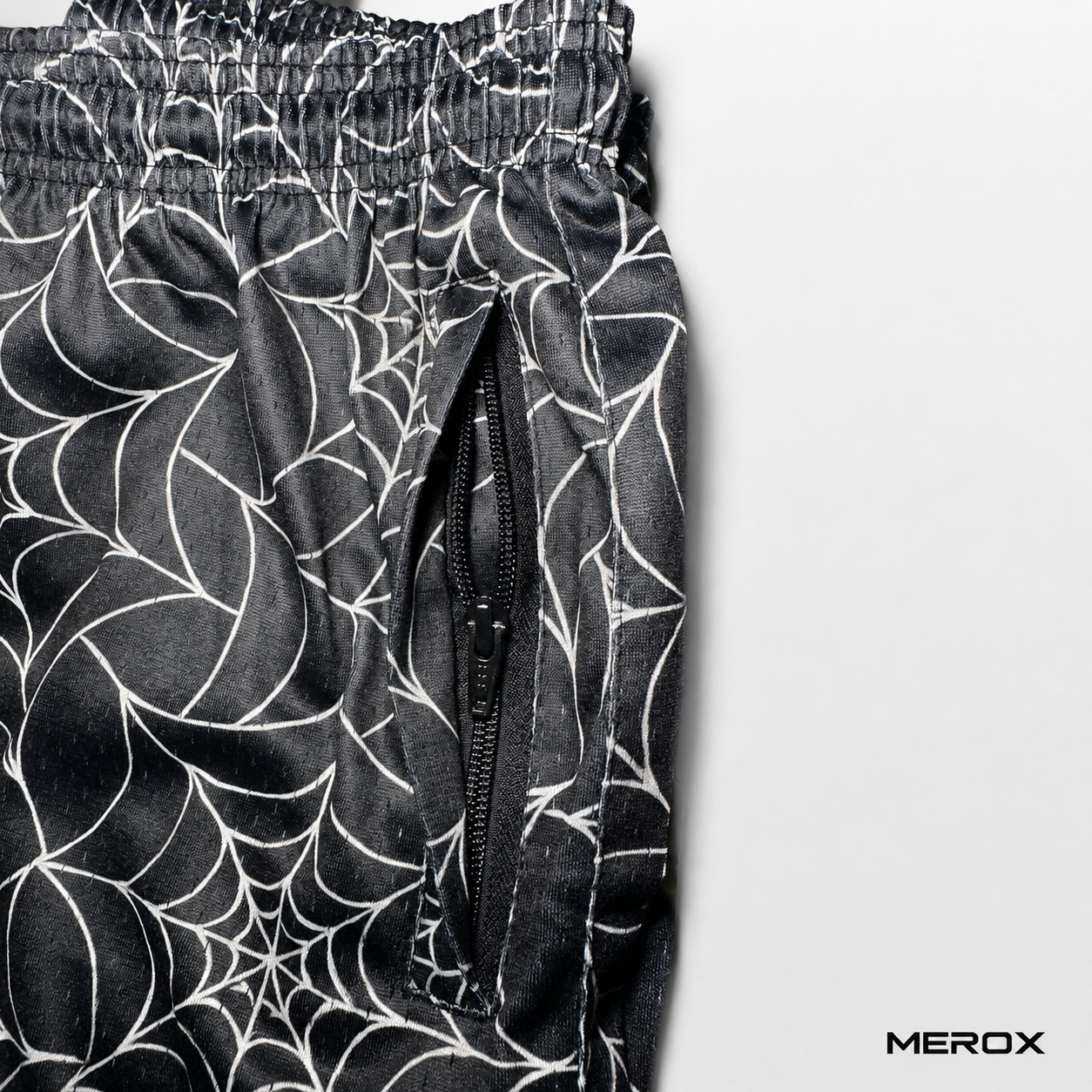 MEROX Spider Web mesh shorts zipper pocket detail