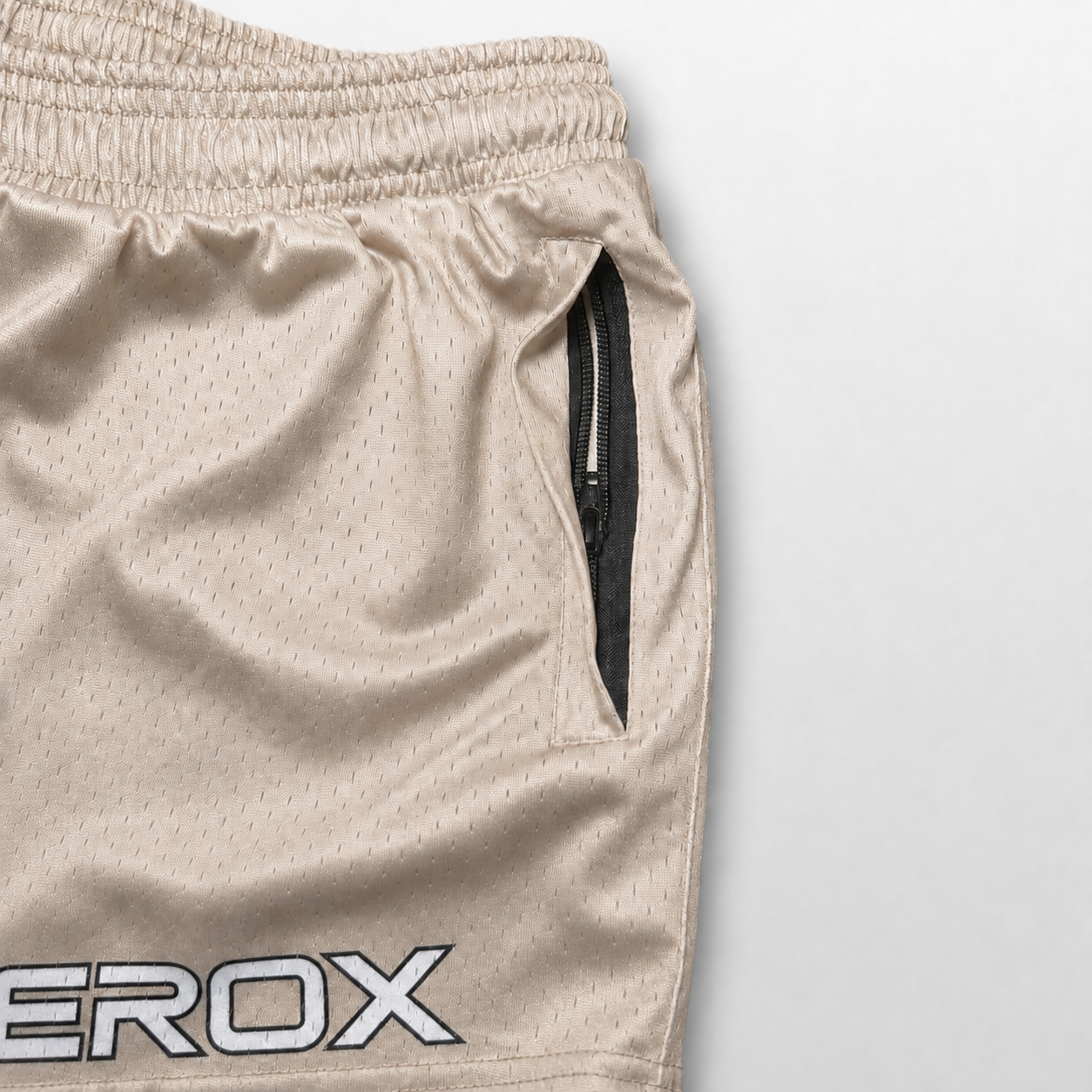 MEROX Tan mesh shorts zipper pocket detail