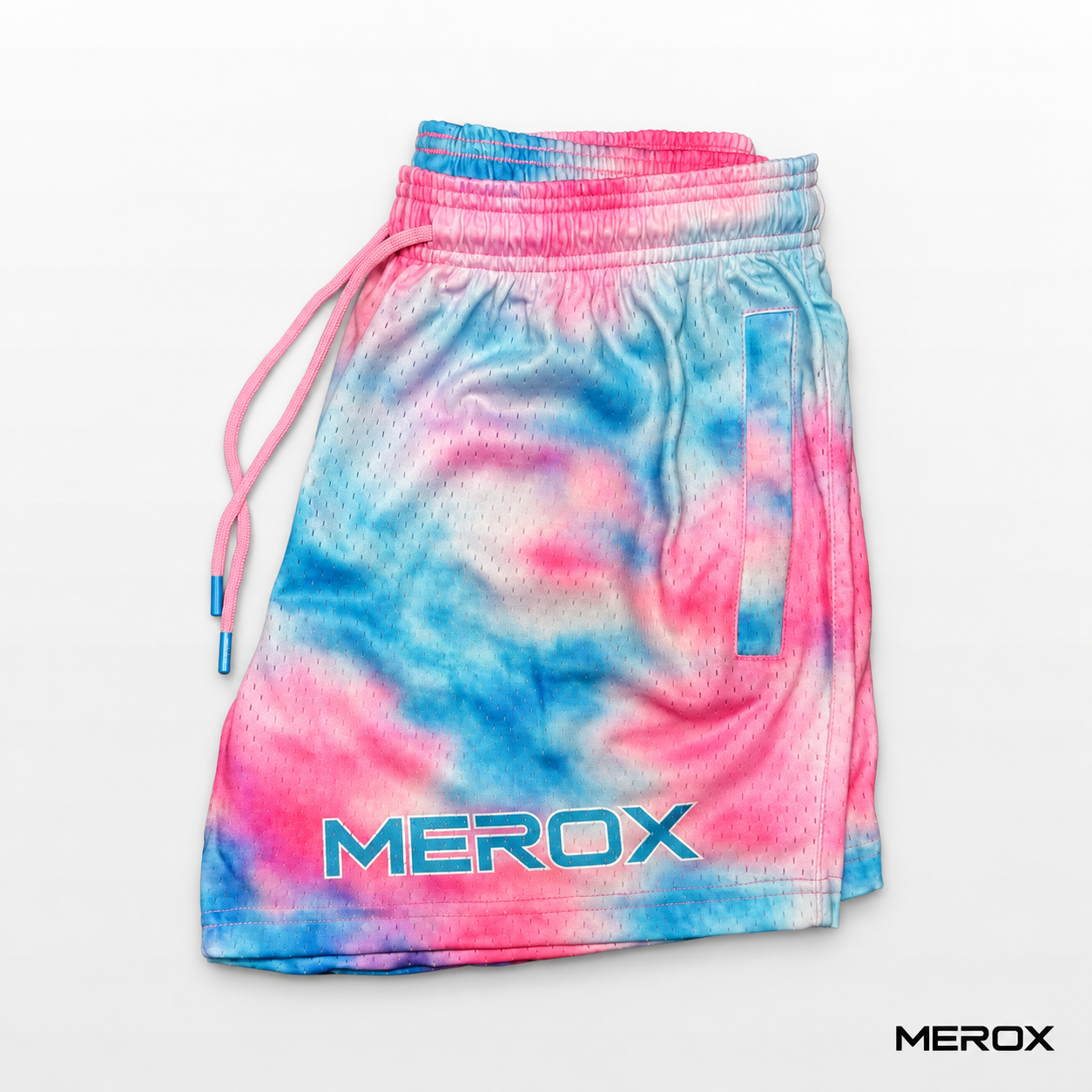MEROX pink and blue tie-dye 5-inch mesh shorts angled side view